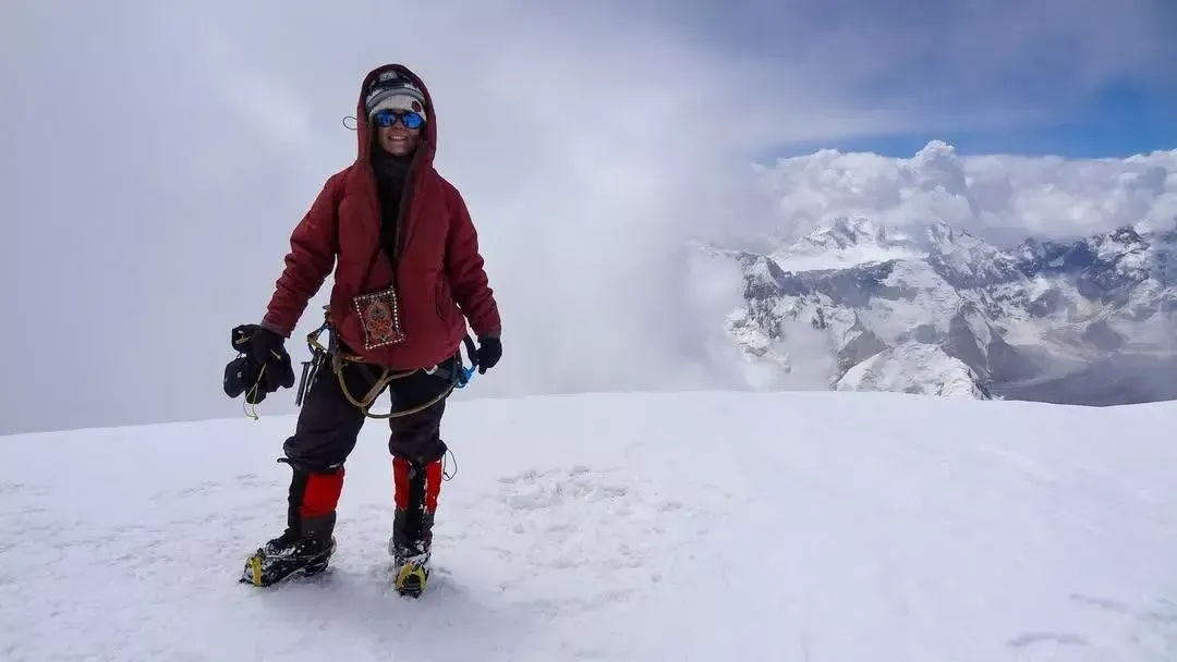 Photo of Natalia Nagovitsyna on a mountain summit