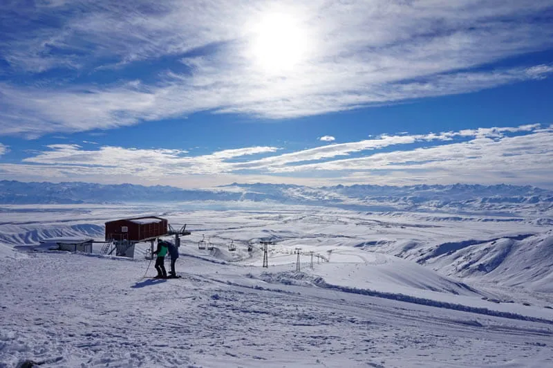 Stunning view of the snowy mountains on the slopes of Too-Ashuu in Kyrgyzstan